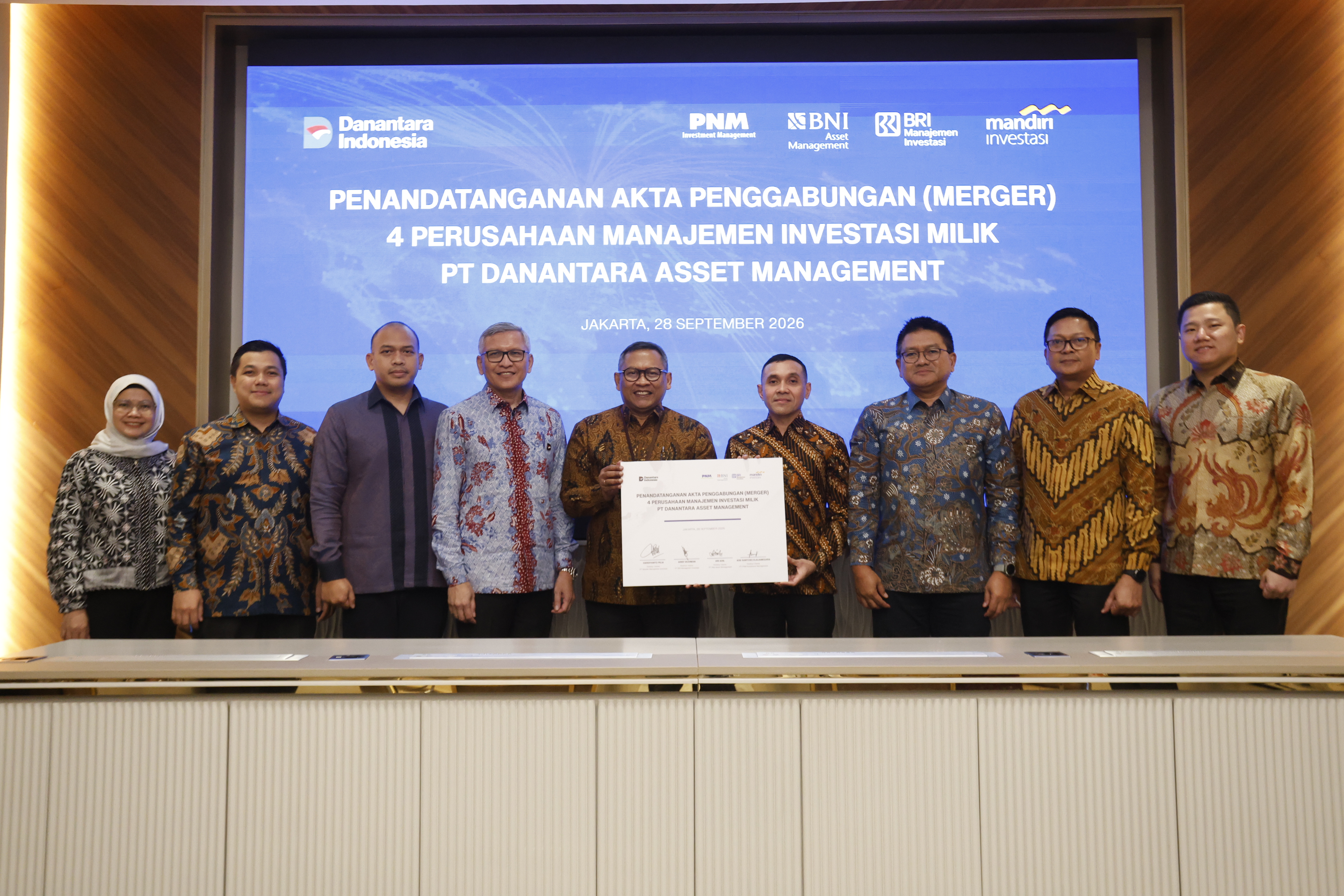 Pengumuman Penggabungan Usaha dan Perubahan Nama Perusahaan